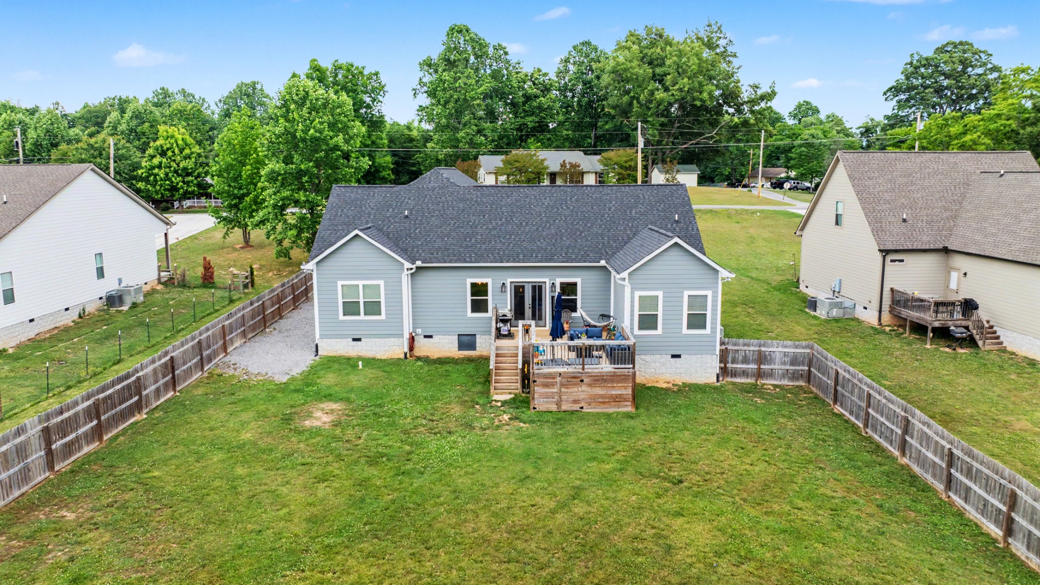 601 King Ridge Road Dowelltown, TN 37059 - Photo 44 of 49 a view of house with backyard and outdoor seating