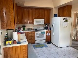 53 Miller Road Mill Run, PA 15464 - Photo 13 of 18 a kitchen with stainless steel appliances a refrigerator sink and cabinets