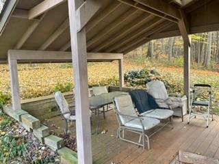 53 Miller Road Mill Run, PA 15464 - Photo 15 of 18 a balcony with couple of chairs and a couple of dining room view