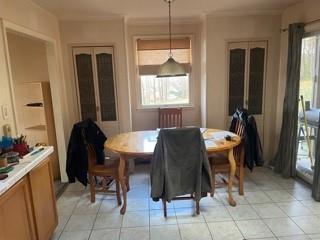 53 Miller Road Mill Run, PA 15464 - Photo 18 of 18 a view of a dining room with furniture and a window