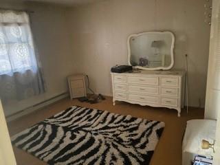 53 Miller Road Mill Run, PA 15464 - Photo 7 of 18 a bedroom with a bed and a mirror