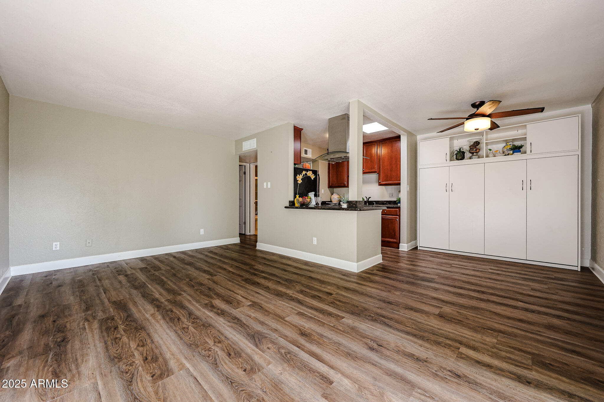 4419 North 27th Street, Unit 22 Phoenix, AZ 85016 - Photo 13 of 46 a view of a kitchen with wooden floor