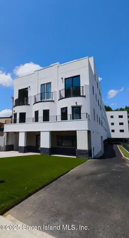 a view of building with yard