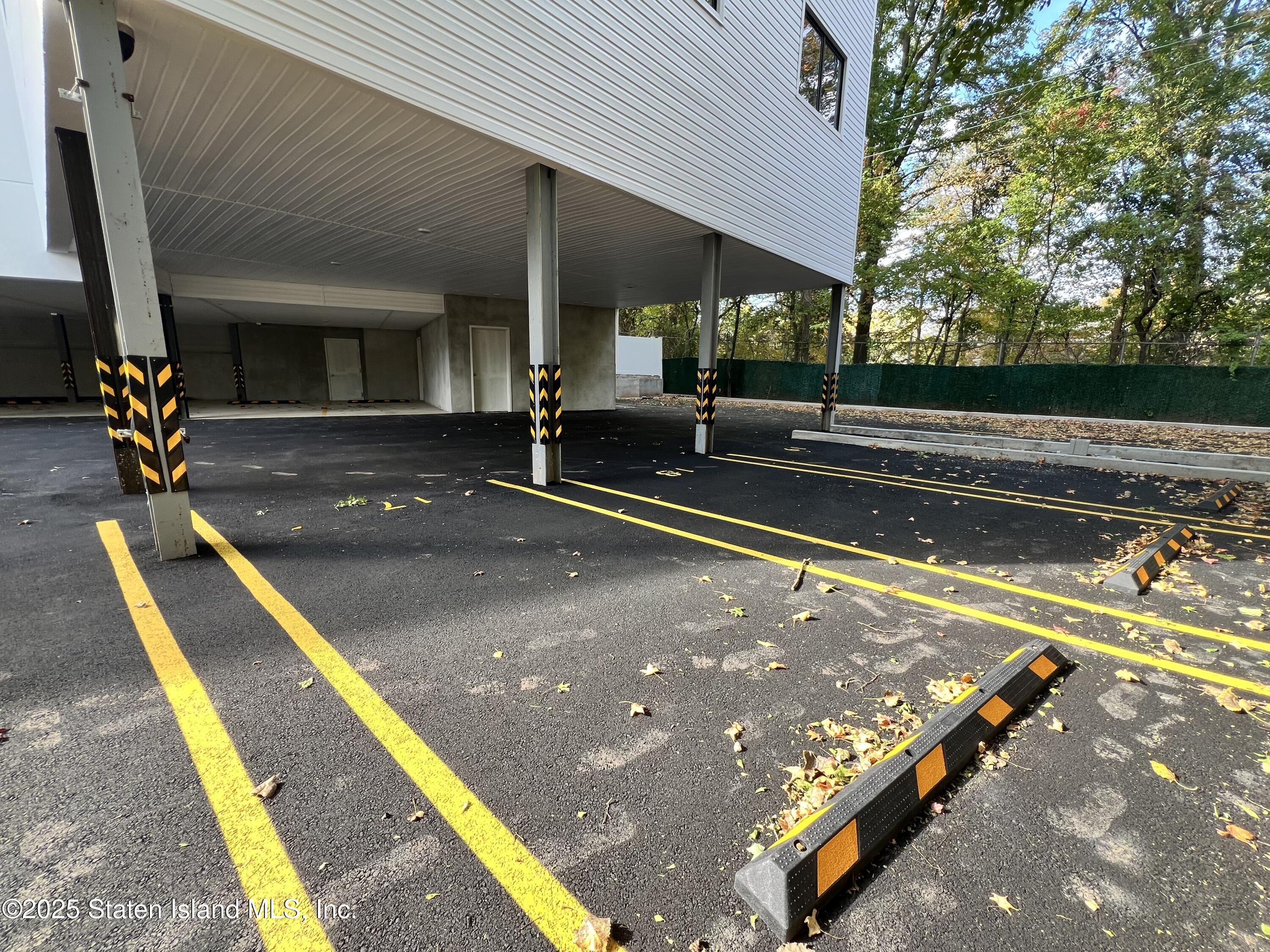 3865 Amboy Road, Unit 4A Staten Island, NY 10308 - Photo 17 of 18 a view of a patio with a table and chairs