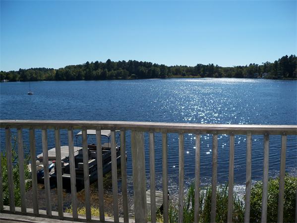 52 Pequot Point Road Westfield, MA 01085 - Photo 1 of 17 a view of a lake from balcony