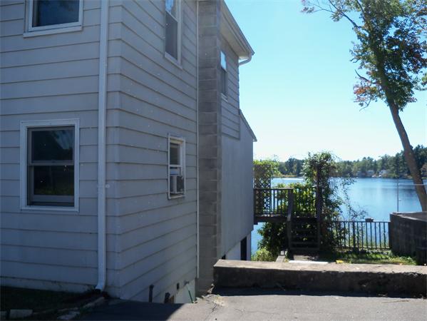 52 Pequot Point Road Westfield, MA 01085 - Photo 3 of 17 a view of a door of the house and front door