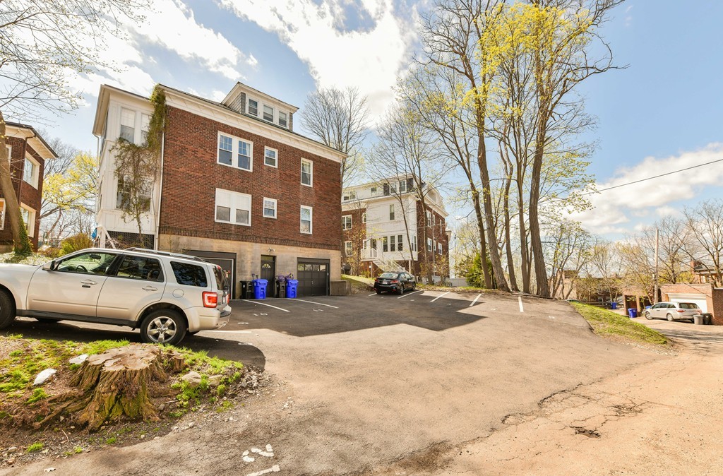 114 Addington Road, Unit 1 Brookline, MA 02445 - Photo 7 of 15 a view of a street with cars