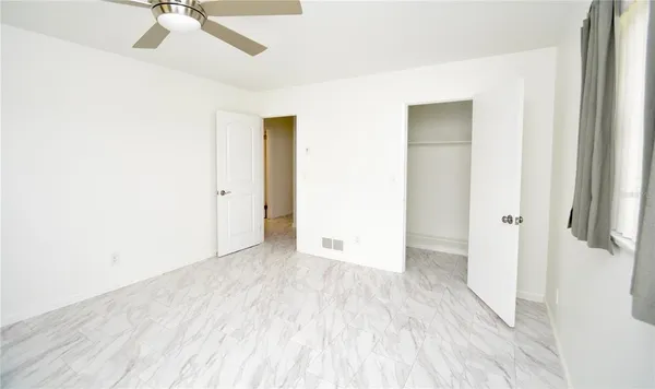 a bathroom with a sink a mirror and a shower