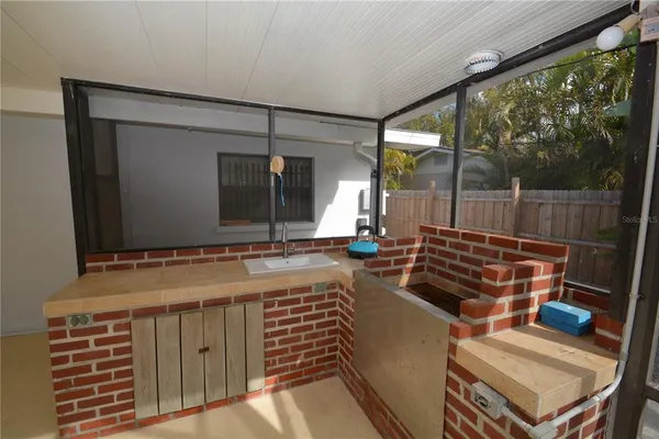 a view of a yard with a patio