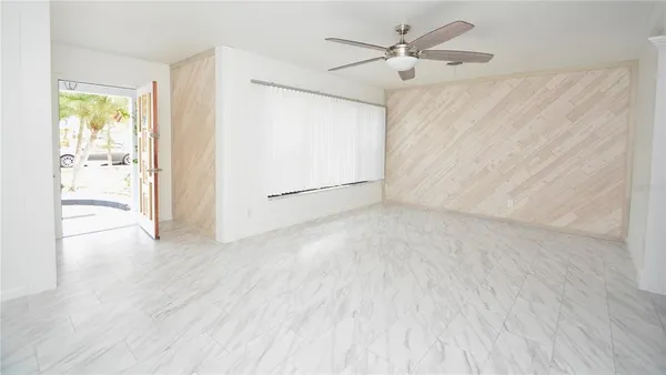 a view of a backyard with pathway