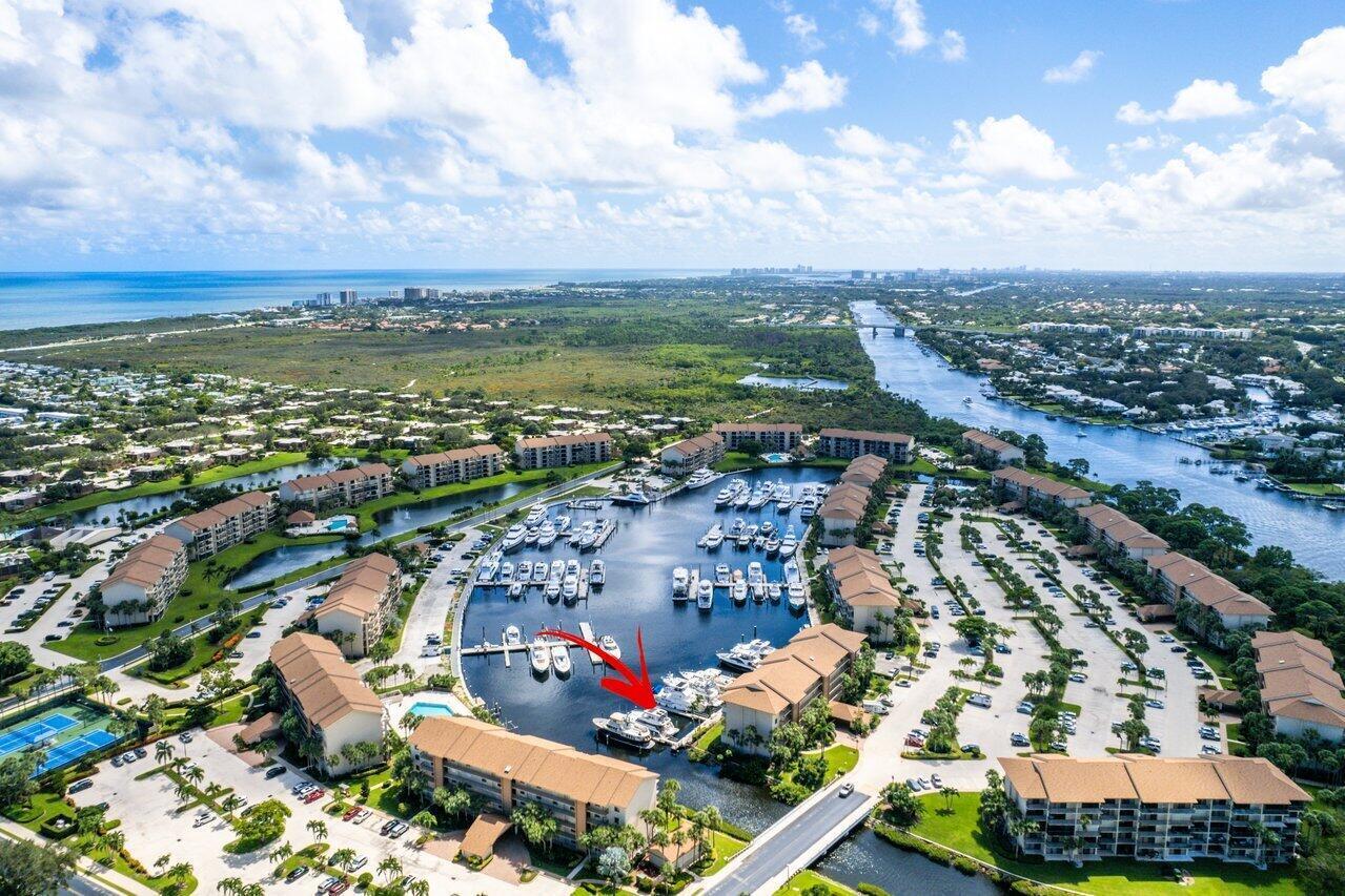 1320 Tidal Pointe Boulevard, Unit G12 Jupiter, FL 33477 - Photo 2 of 6 an aerial view of a city