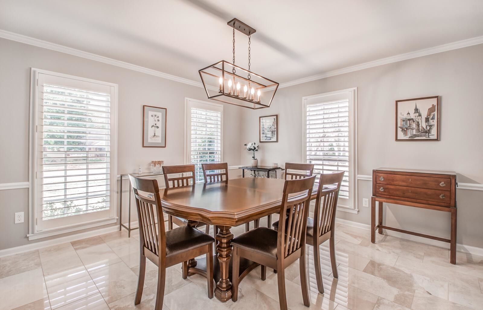 408 Avon Road Memphis, TN 38117 - Photo 7 of 25 a view of a dining room with furniture window and outside view