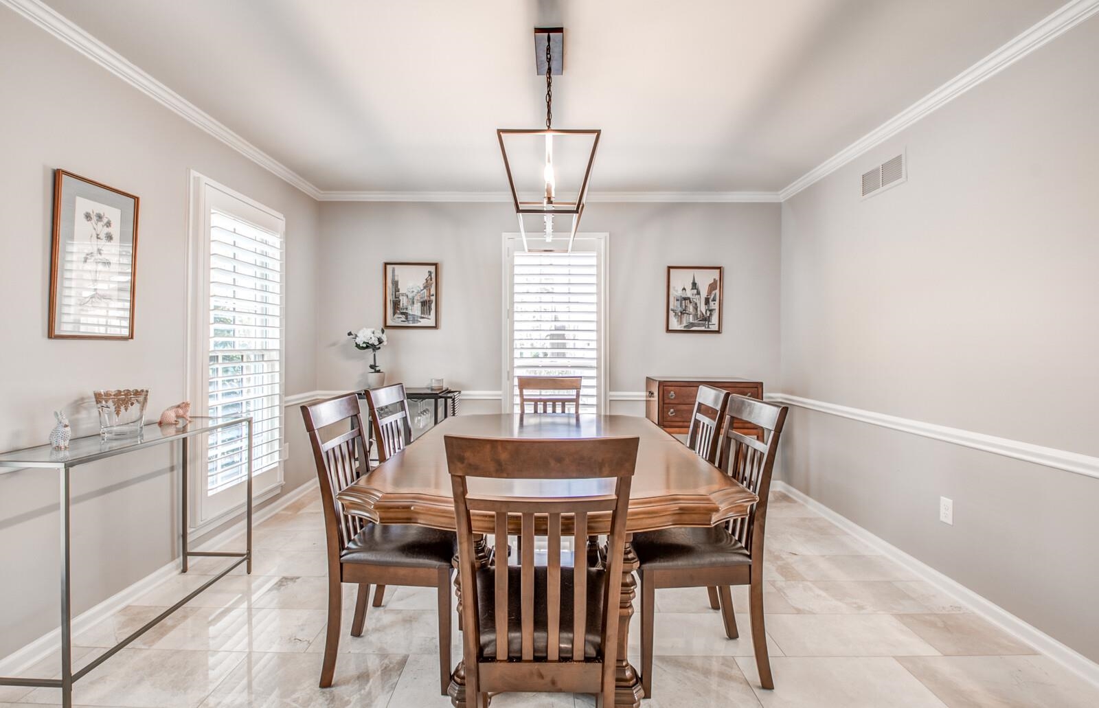 408 Avon Road Memphis, TN 38117 - Photo 8 of 25 a view of a dining room with furniture and window