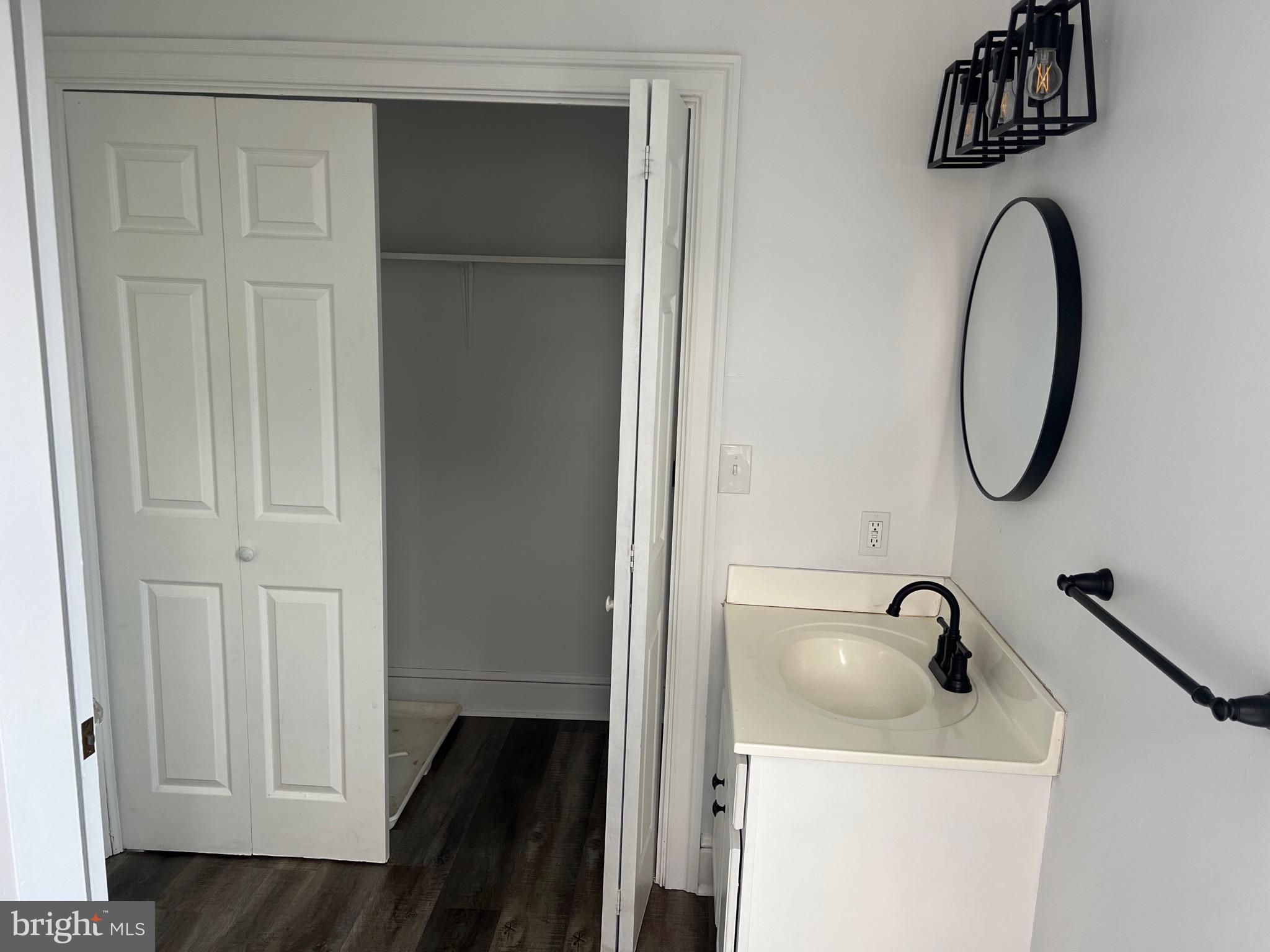 533 Thomas Street York, PA 17404 - Photo 16 of 26 a bathroom with a sink and a mirror