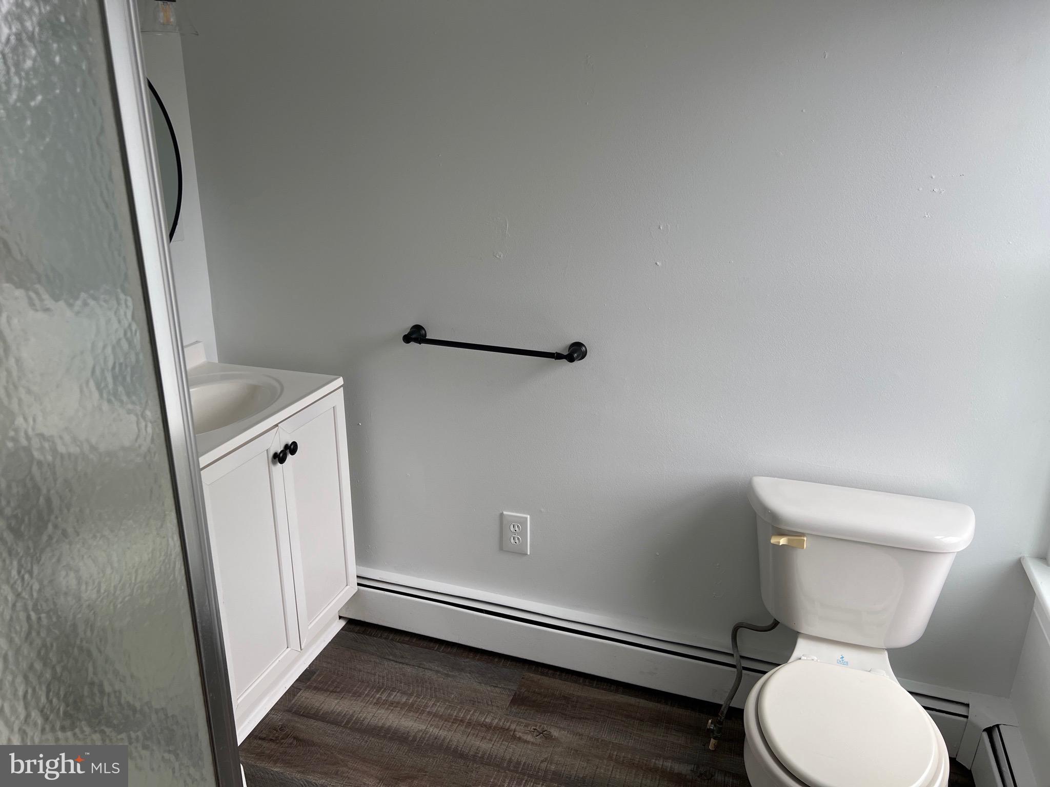 533 Thomas Street York, PA 17404 - Photo 20 of 26 a white toilet sitting next to a bathroom sink