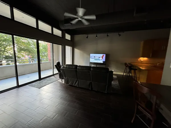 a view of an empty room with a windows