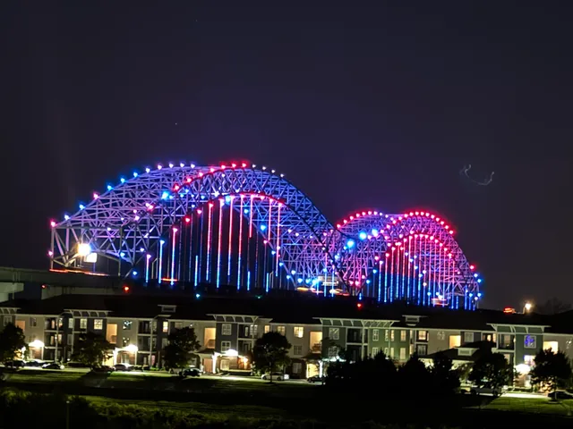 a building with swimming pool in front of it