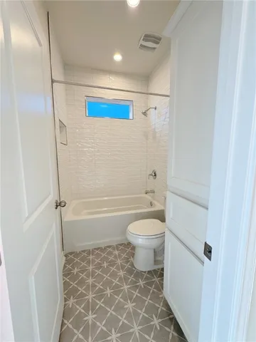 a spacious bathroom with a double vanity sink mirror and