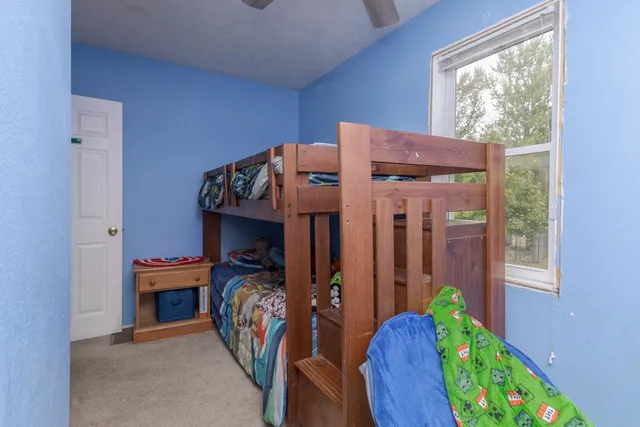 a view of an chairs and table in a balcony