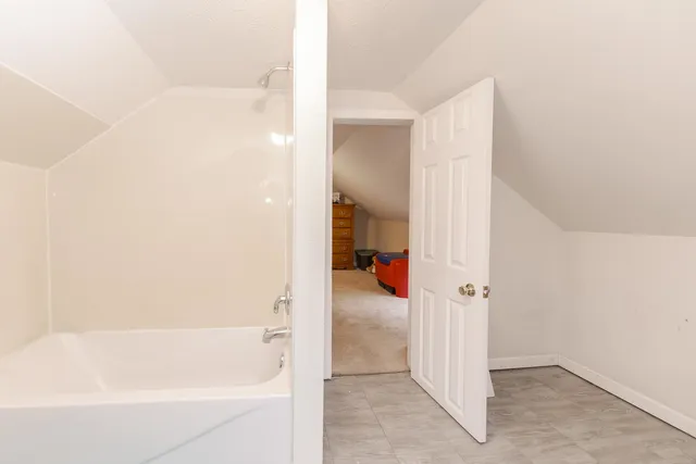 a bathroom with a bathtub