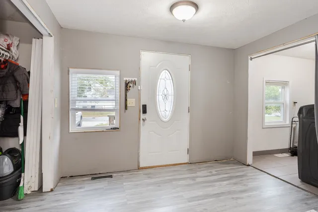 a view of livingroom with hardwood floor and hallway