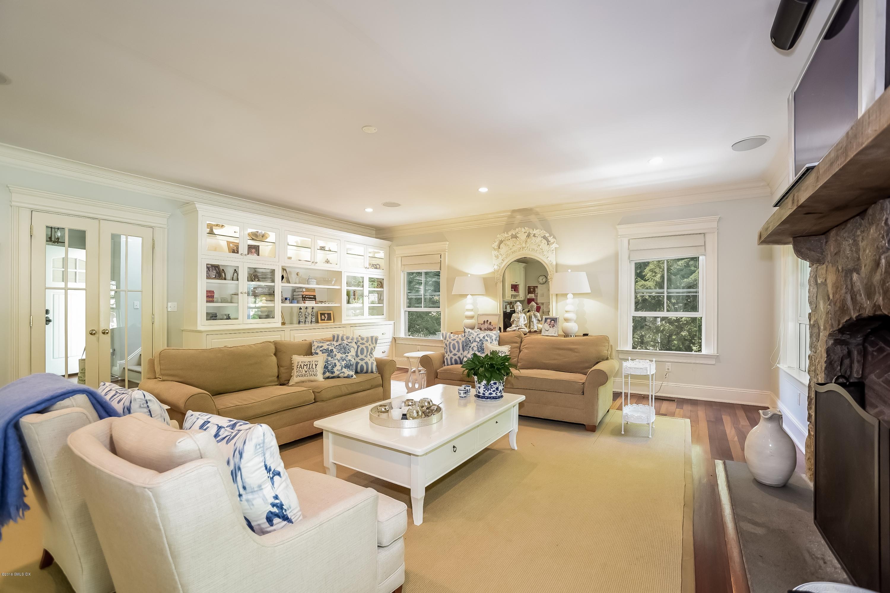 35 Lockwood Road Riverside, CT 06878 - Photo 18 of 39 a living room with furniture and a large window