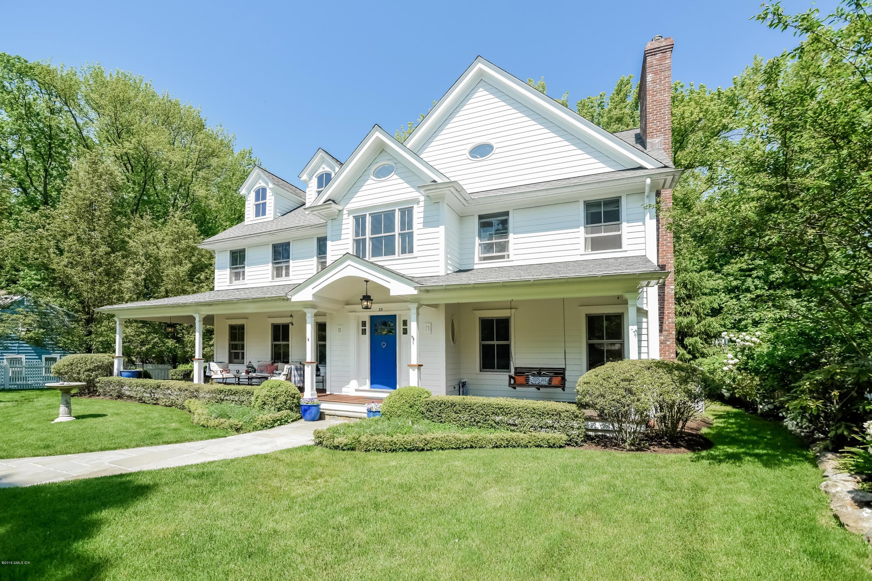 35 Lockwood Road Riverside, CT 06878 - Photo 2 of 39 a front view of a residential houses with yard and green space