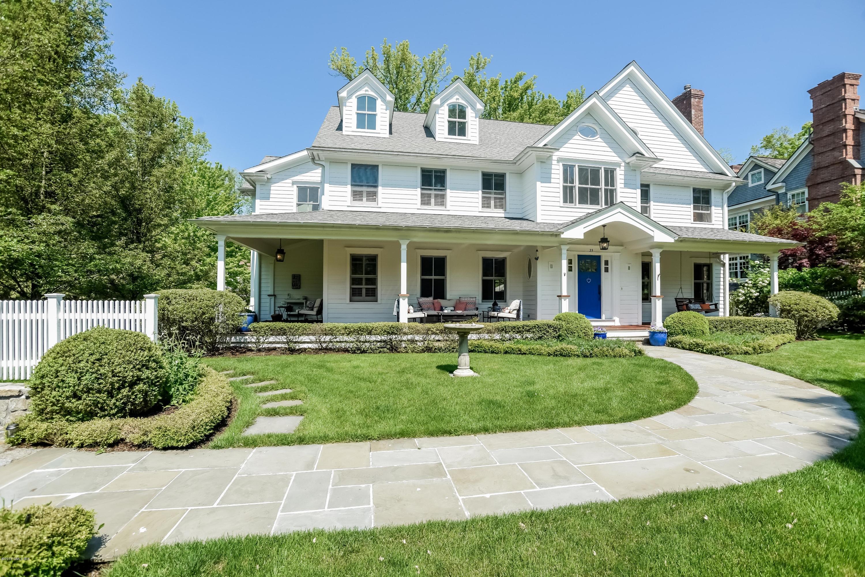 35 Lockwood Road Riverside, CT 06878 - Photo 4 of 39 a front view of a house with a yard