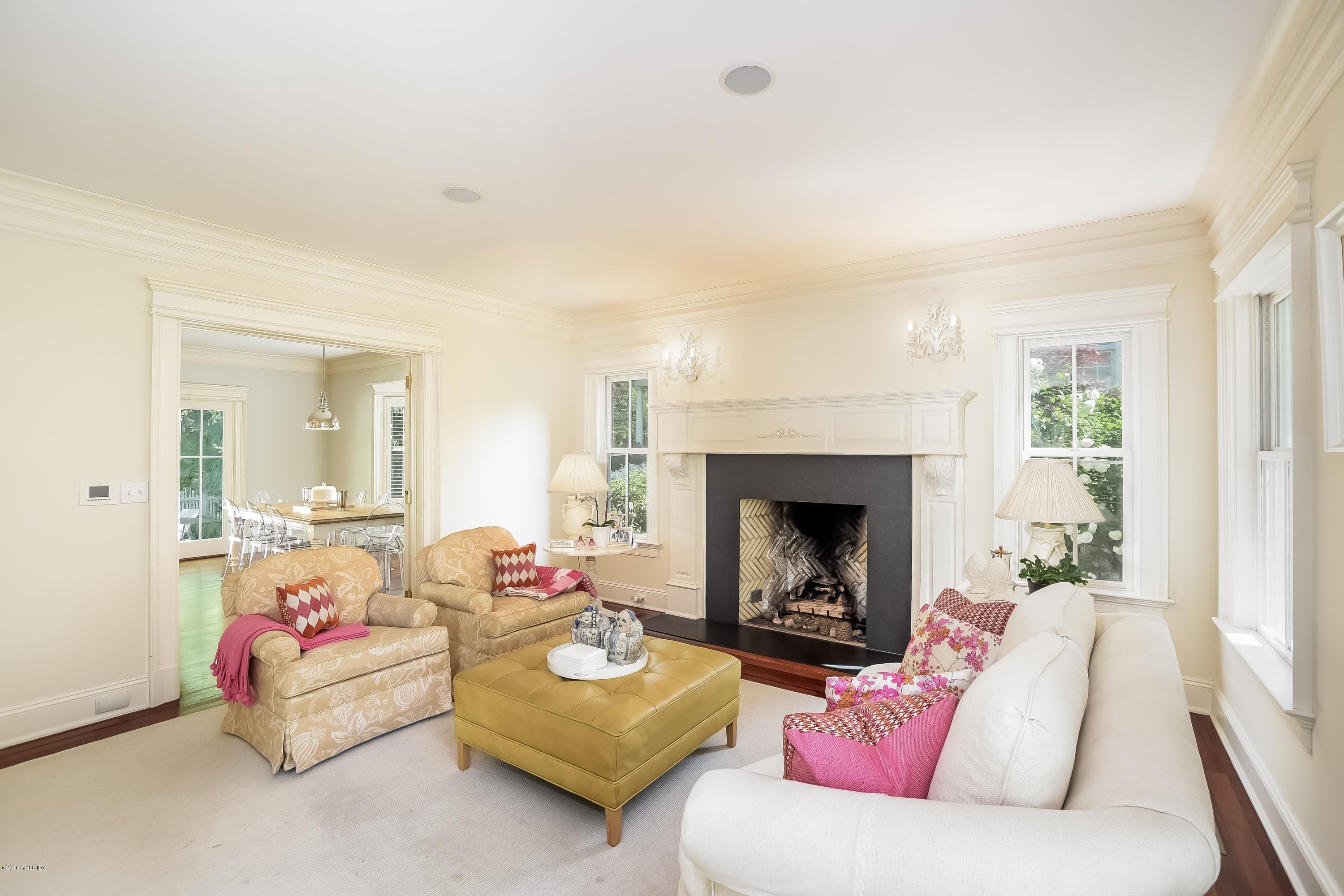 35 Lockwood Road Riverside, CT 06878 - Photo 7 of 39 a living room with furniture and a fireplace