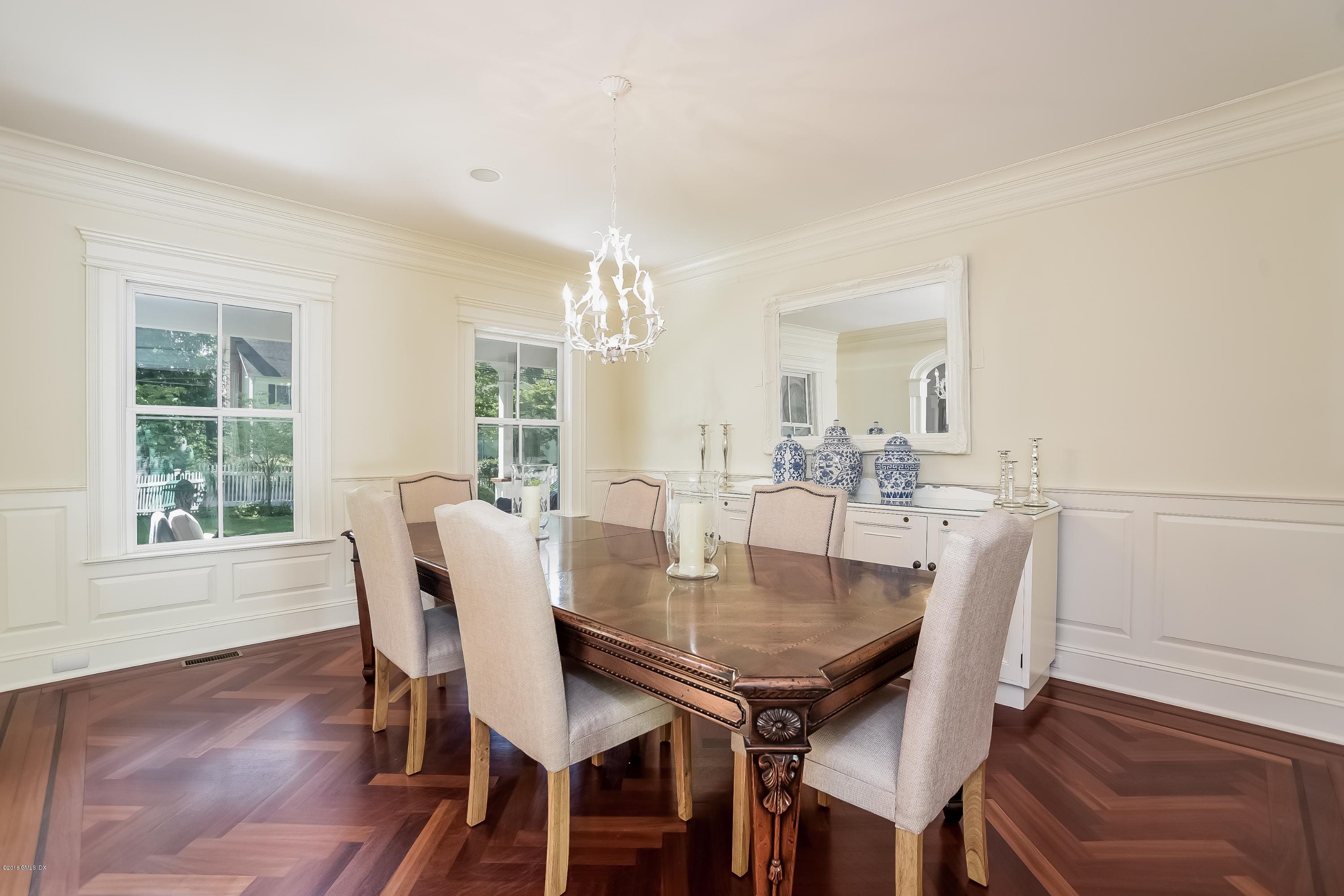 35 Lockwood Road Riverside, CT 06878 - Photo 9 of 39 a view of a dining room with furniture and wooden floor