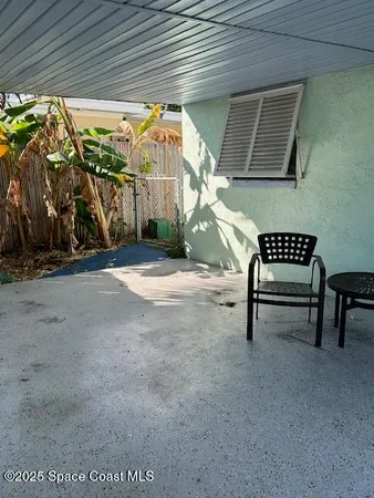 a view of outdoor space with porch and furniture
