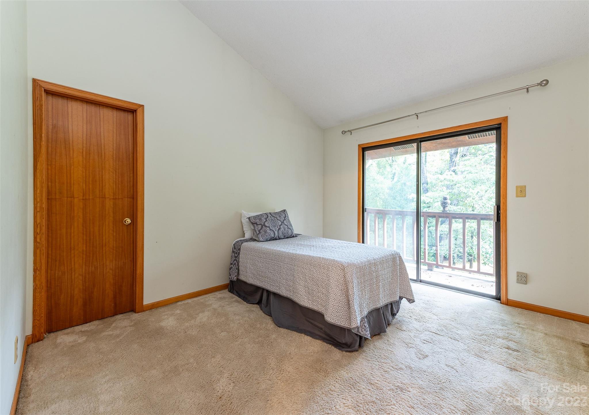 5023 Rounding Run Road Charlotte, NC 28277 - Photo 27 of 38 a spacious bedroom with a bed and a window