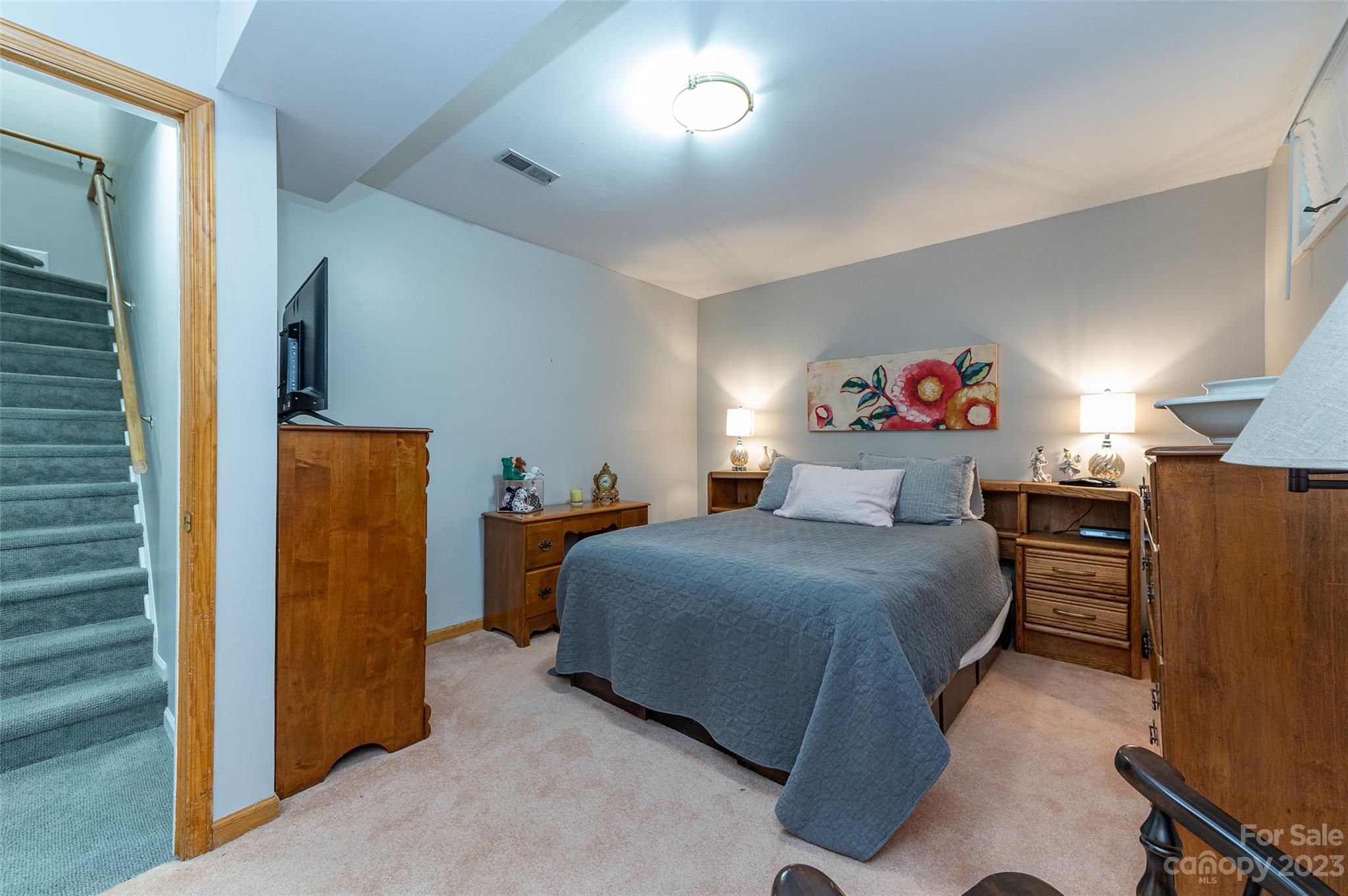 5023 Rounding Run Road Charlotte, NC 28277 - Photo 30 of 38 a bedroom with a bed and wooden floor
