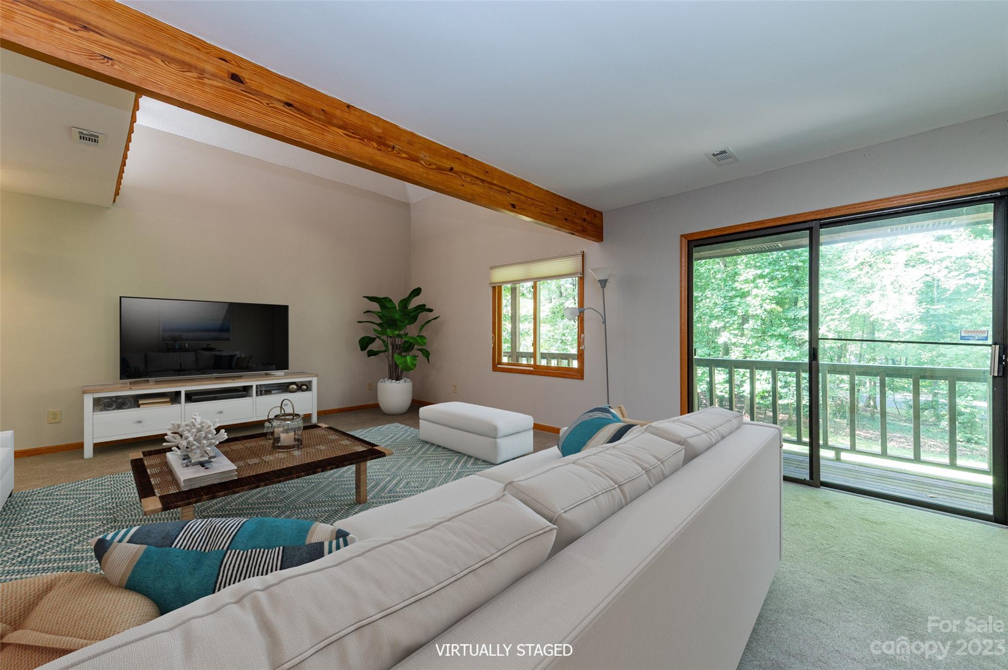 5023 Rounding Run Road Charlotte, NC 28277 - Photo 6 of 38 a living room with furniture and a flat screen tv