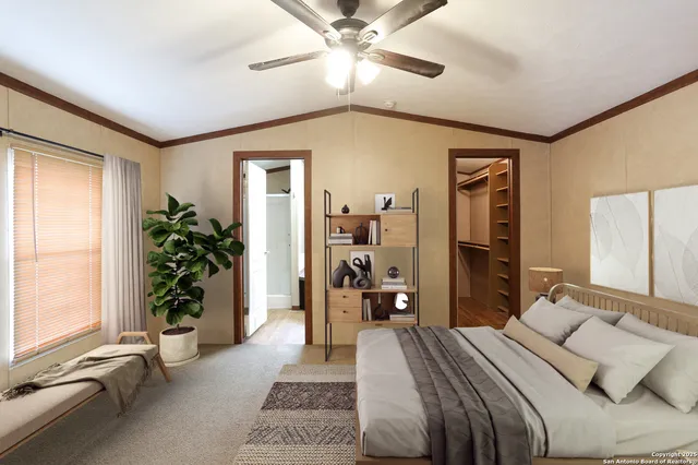 a bedroom with a bed and a potted plant