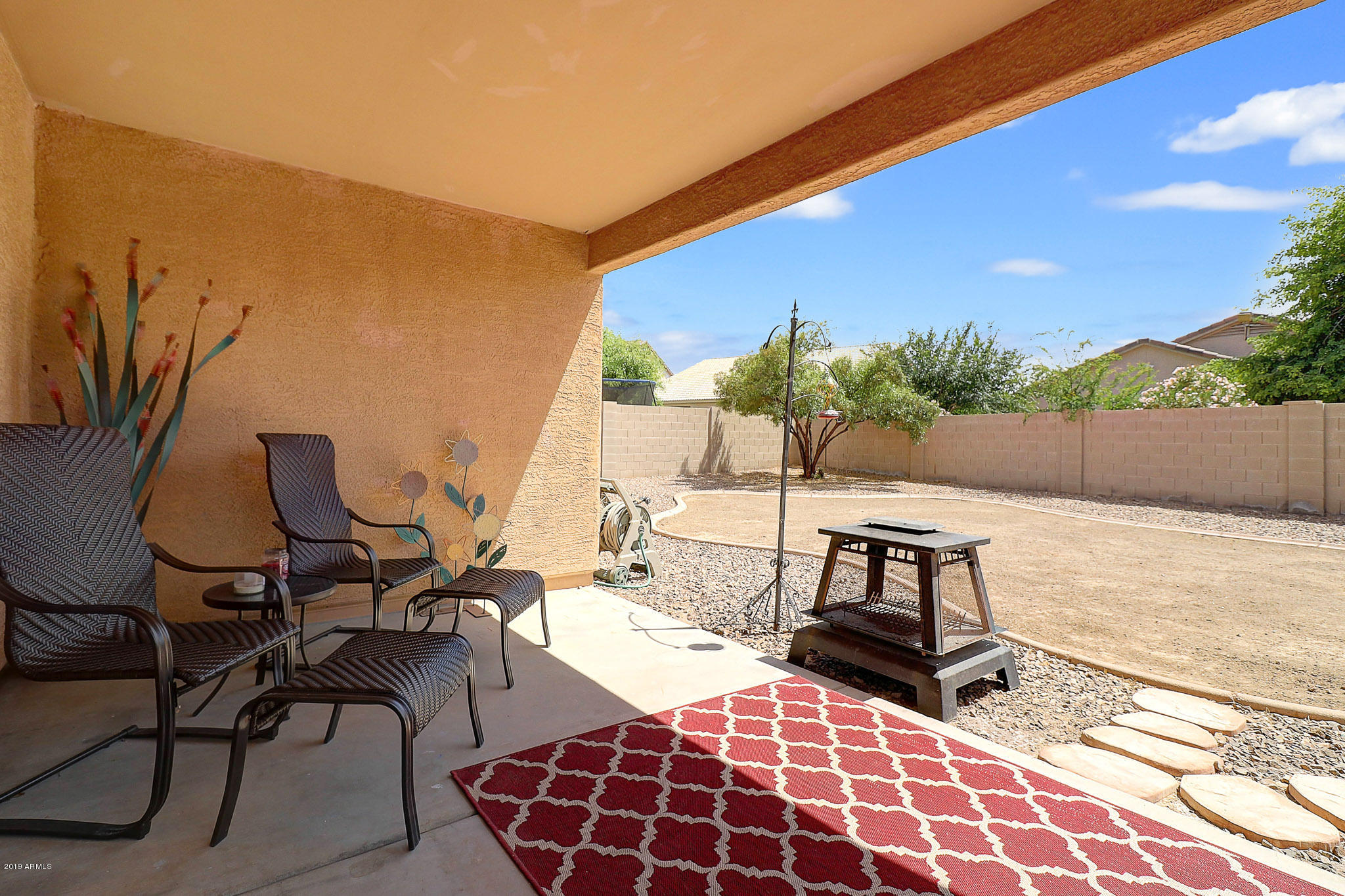 9947 West Riverside Avenue Tolleson, AZ 85353 - Photo 21 of 25 a view of an outdoor sitting area with furniture