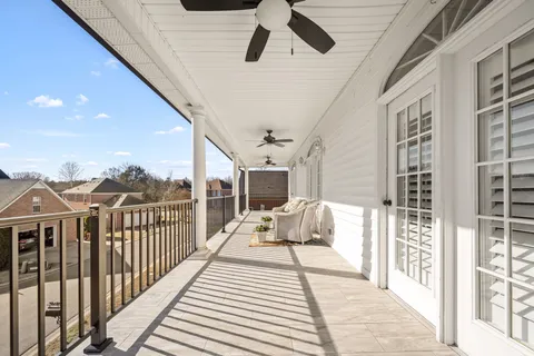 a balcony with furniture