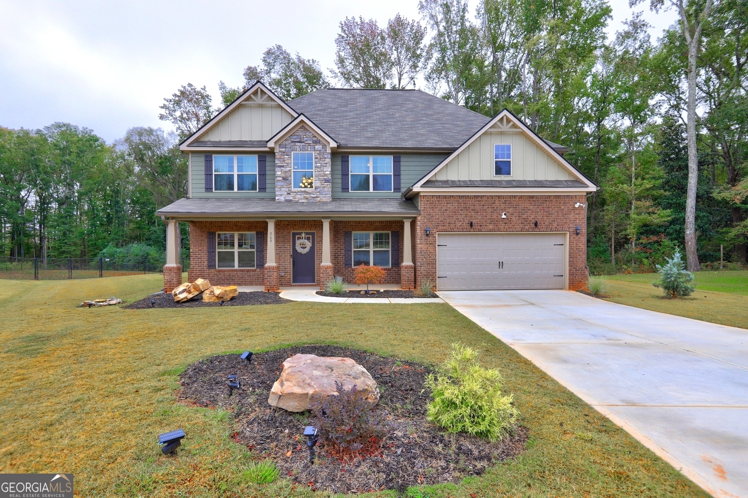 269 Baumgard Way Locust Grove, GA 30248 - Photo 1 of 23 a front view of a house with a yard