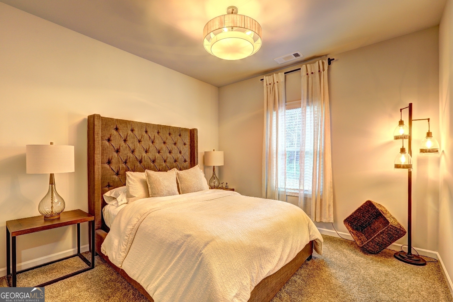 269 Baumgard Way Locust Grove, GA 30248 - Photo 12 of 23 a bedroom with a bed and wooden floor