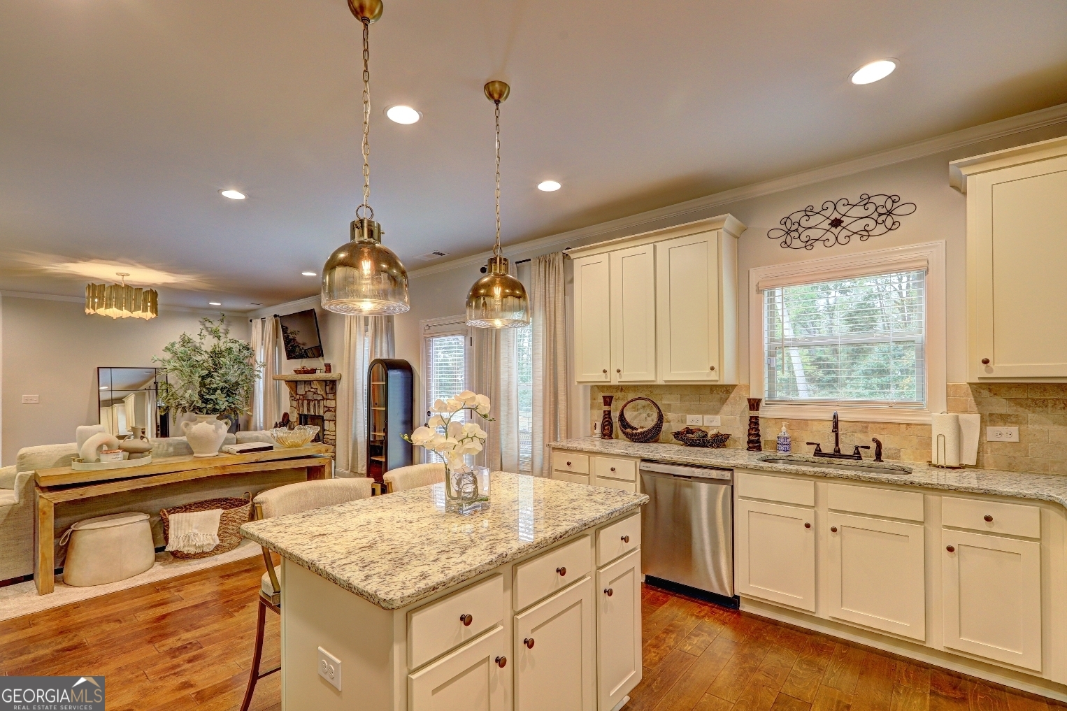 269 Baumgard Way Locust Grove, GA 30248 - Photo 6 of 23 a kitchen with stainless steel appliances granite countertop a sink stove and cabinets
