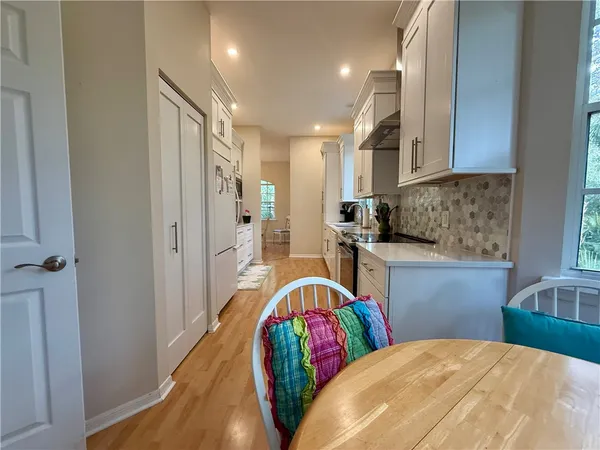 a very nice looking bedroom with a large window