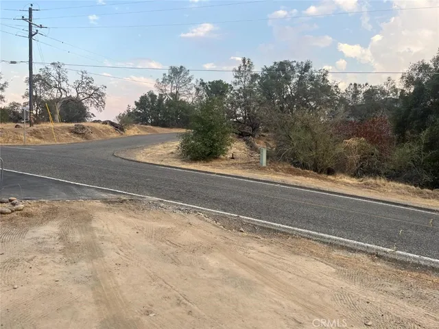 a view of a parking space and a street view
