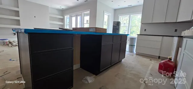 a view of a house with a big yard