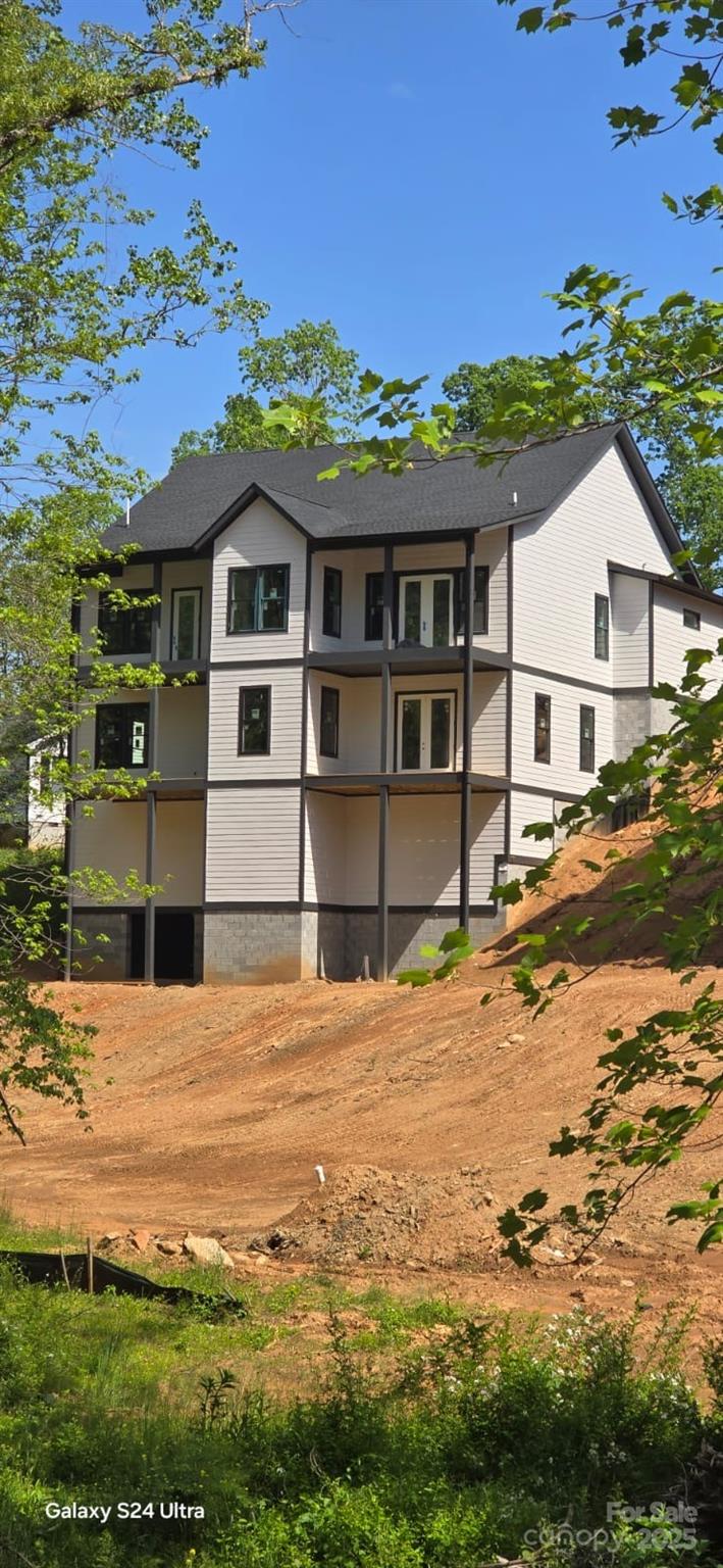 23 George Allen Ridge Arden, NC 28704 - Photo 6 of 7 a view of a house with a big yard