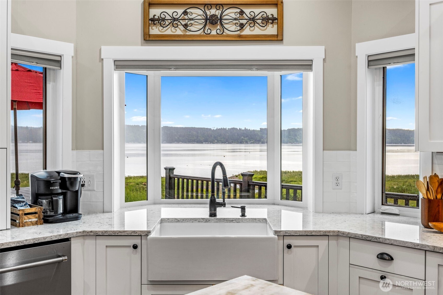 6591 Northeast North Shore Road Belfair, WA 98528 - Photo 17 of 37 a kitchen with a sink and a large window