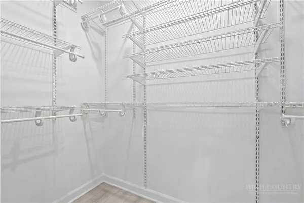 a view of small space with racks on the wall