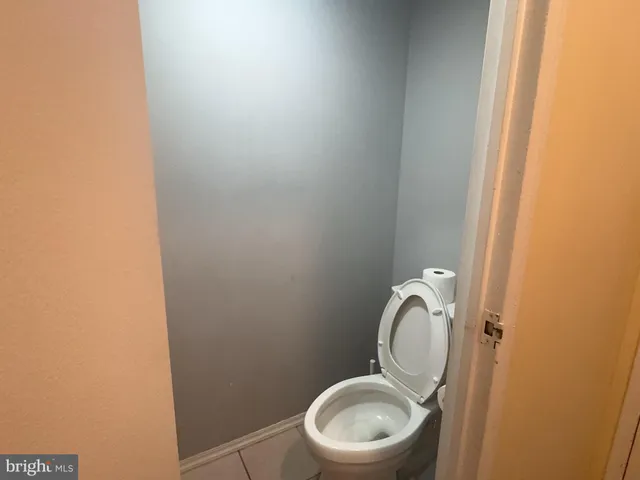 a close view of a bathroom with toilet