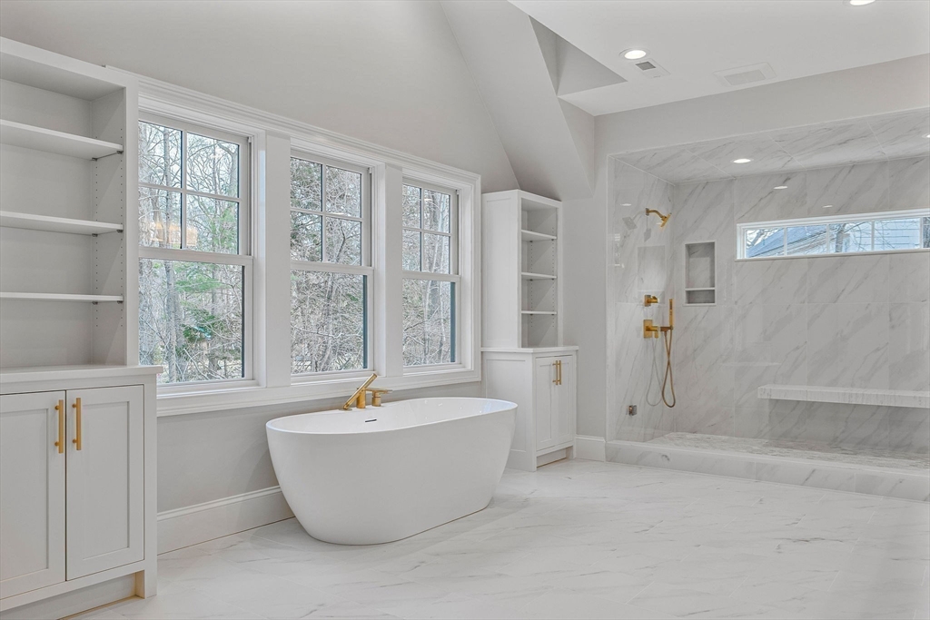 30 Hobart Road Wellesley, MA 02482 - Photo 12 of 40 a bathroom with a bathtub and shower