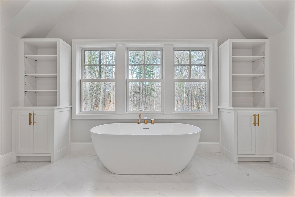 30 Hobart Road Wellesley, MA 02482 - Photo 15 of 40 a white bath tub sitting next to a window