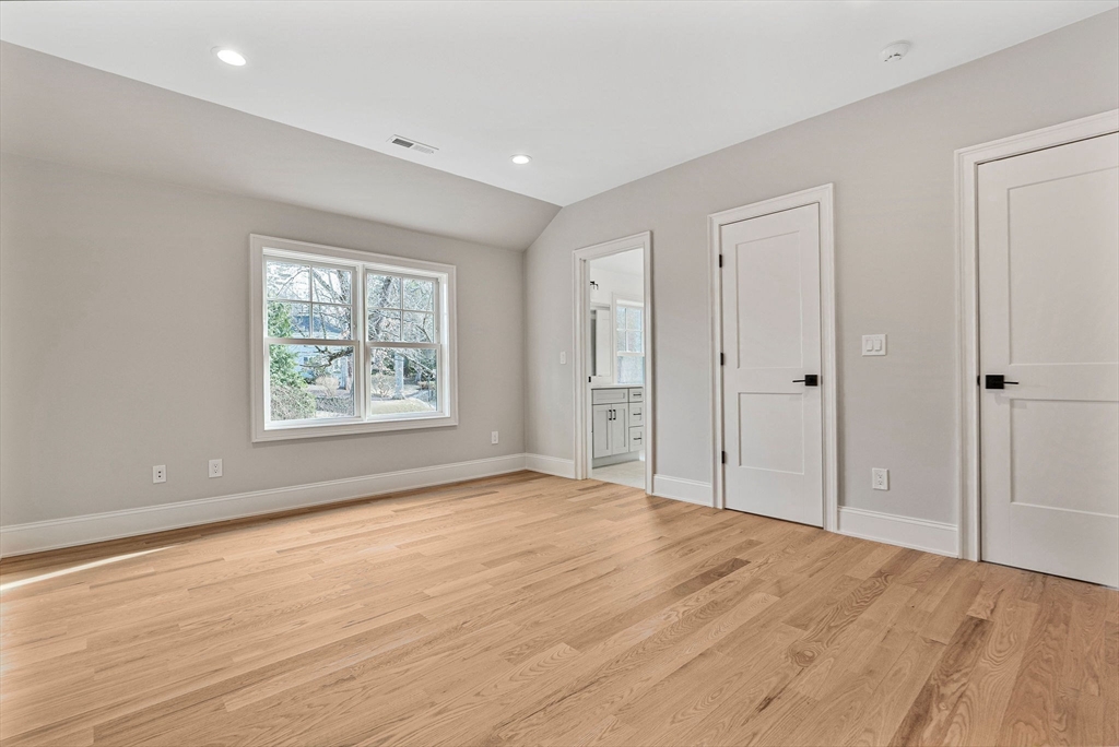 30 Hobart Road Wellesley, MA 02482 - Photo 22 of 40 an empty room with windows and closet